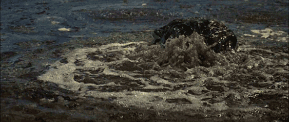 Hedorah emerging from bubbling water