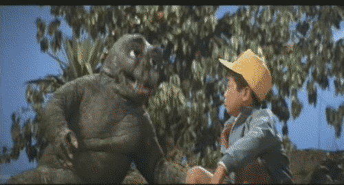 Minilla nodding in a chat with Ichiro