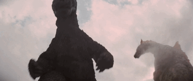 Godzilla and Titanosaurus brawl with some low-angle shots
