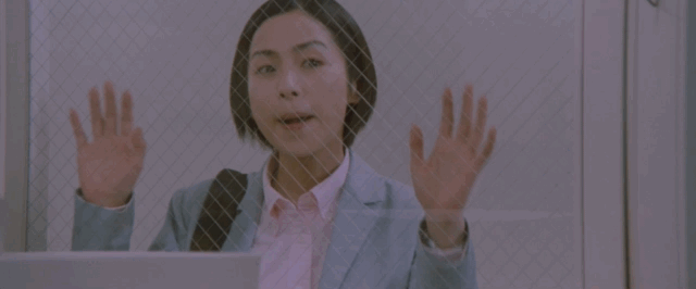 Yuki awkwardly waving goodbye with both hands