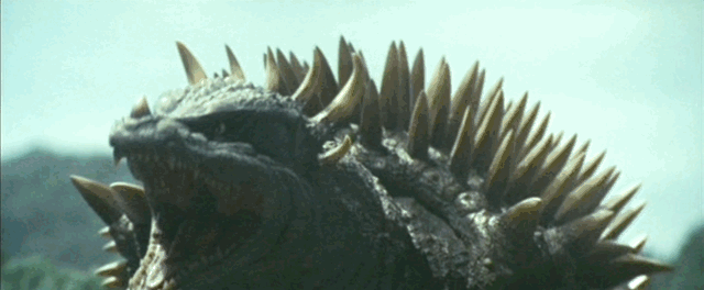 Anguirus, King Caesar, and Rodan all rush Godzilla, who stomps Anguirus and leaps out of the way, skidding to a stop and posing victorious
